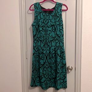 Emerald green and navy patterned EnFocus Studio dress.